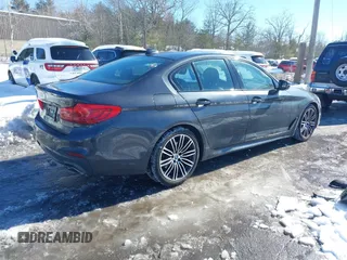 2019 BMW 5 Series 530i xDrive with VIN WBAJA7C50KWW05263, listed as a IAAI auction lot 41571583 with 71,185 mi miles and . Bid and sale history available at DreamBid. Image 4.