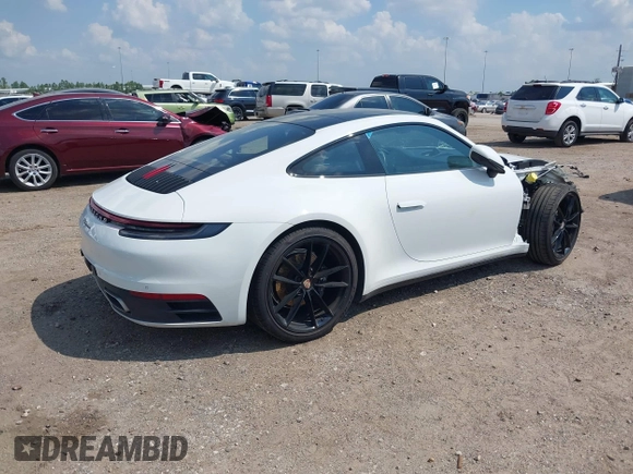 2022 Porsche 911 Carrera with VIN WP0AA2A91NS206000, listed as a IAAI auction lot 40382242 with 26,394 mi miles. Bid and sale history available at carsss.com. Image 4.