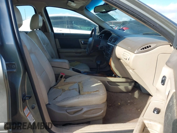 2002 Ford Taurus z VIN 1FAHP59SX2G137396, wystawiony jako IAAI lot #41661425 z przebiegiem 155 789 mil mil oraz . Historia ofert i sprzedaży dostępna na DreamBid. Obrazek 5.