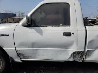 2002 Ford Ranger XL Fleet with VIN 1FTYR10E02PA63992, listed as a Copart auction lot 74987714 with 188,731 mi miles and Salvage Title. Bid and sale history available at carsss.com. Image 7.