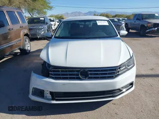 2017 Volkswagen Passat S with VIN 1VWAT7A33HC083492, listed as a IAAI auction lot 42117212 with 96,994 mi miles and . Bid and sale history available at DreamBid. Image 12.