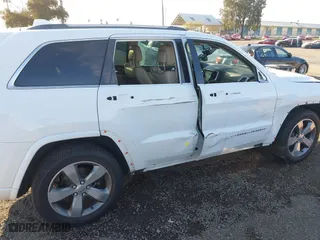 2014 Jeep Grand Cherokee Overland with VIN 1C4RJFCG8EC162271, listed as a IAAI auction lot 41827017 with 183,447 mi miles. Bid and sale history available at carsss.com. Image 6.
