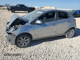2011 Mazda 2 Touring z VIN JM1DE1HZ4B0104473, wystawiony jako Copart lot #73572804 z przebiegiem Nie podano mil oraz Szkoda całkowita • Salvage title. Historia ofert i sprzedaży dostępna na DreamBid. Obrazek 1.