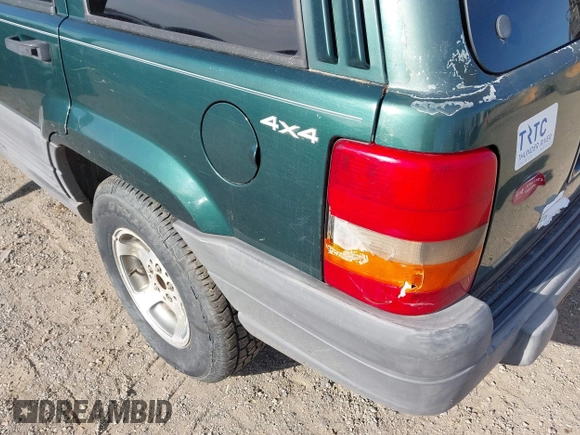 1998 Jeep Grand Cherokee Laredo with VIN 1J4GZ58S5WC362365, listed as a IAAI auction lot 41891397 with 246,673 mi miles. Bid and sale history available at carsss.com. Image 6.