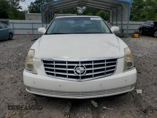 2006 Cadillac DTS 1SC z VIN 1G6KD57Y26U177384, wystawiony jako Copart lot #58200665 z przebiegiem 122 356 mil mil oraz Szkoda całkowita • Salvage title. Historia ofert i sprzedaży dostępna na DreamBid. Obrazek 5.