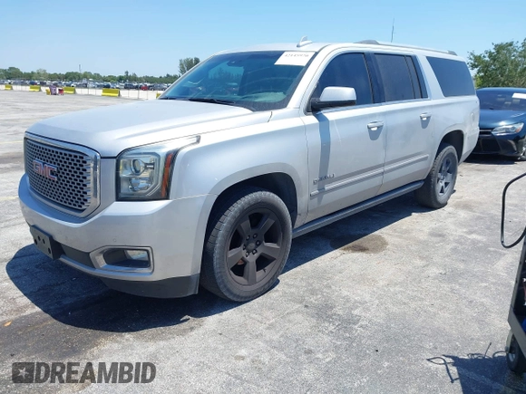 2016 GMC Yukon XL Denali with VIN 1GKS2HKJXGR423556, listed as a IAAI auction lot 42145970 with 118,436 mi miles. Bid and sale history available at carsss.com. Image 2.