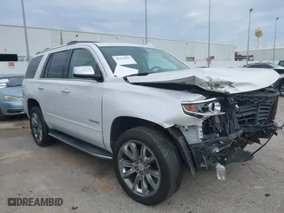 2018 Chevrolet Tahoe Premier with VIN 1GNSCCKC1JR305097, listed as a IAAI auction lot 41233962 with 154,043 mi miles. Bid and sale history available at carsss.com. Image 1.