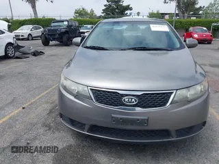 2012 Kia Forte EX with VIN KNAFU4A2XC5560585, listed as a IAAI auction lot 42121133 with 151,079 mi miles. Bid and sale history available at carsss.com. Image 12.