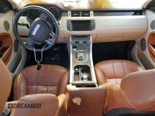 2015 Land Rover Range Rover Evoque Prestige z VIN SALVV2BG2FH012781, wystawiony jako Copart lot #57328405 z przebiegiem Nie podano mil oraz Szkoda całkowita • Salvage title. Historia ofert i sprzedaży dostępna na DreamBid. Obrazek 8.