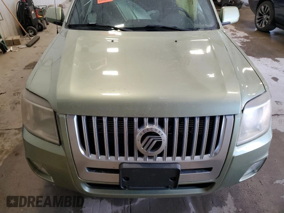 2008 Mercury Mariner Premier z VIN 4M2CU87178KJ32441, wystawiony jako Copart lot #54699275 z przebiegiem 160 782 mil mil oraz Nie do naprawy • Non repairable. Historia ofert i sprzedaży dostępna na DreamBid. Obrazek 12.