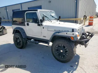 2004 Jeep Wrangler Rubicon z VIN 1J4FA69S34P757352, wystawiony jako Copart lot #52971745 z przebiegiem 139 855 mil mil oraz Szkoda całkowita • Salvage title. Historia ofert i sprzedaży dostępna na DreamBid. Obrazek 4.