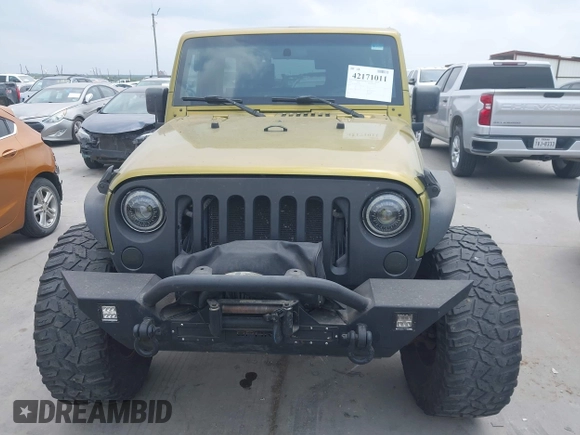 2008 Jeep Wrangler Unlimited Sahara with VIN 1J8GA59108L574959, listed as a IAAI auction lot 42171011 with Not Provided miles and . Bid and sale history available at carsss.com. Image 12.