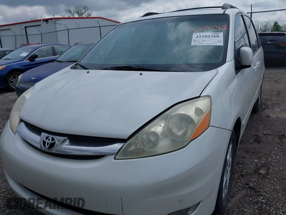 2006 Toyota Sienna XLE with VIN 5TDZA22C36S547762, listed as a IAAI auction lot 42182368 with 166,023 mi miles. Bid and sale history available at carsss.com. Image 6.