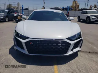 2023 Audi R8 performance quattro z VIN WUACEAFX9P7900103, wystawiony jako Copart lot #57456835 z przebiegiem 5 220 mil mil oraz Szkoda całkowita • Salvage title. Historia ofert i sprzedaży dostępna na DreamBid. Obrazek 5.