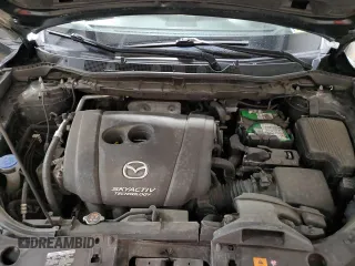 2016 Mazda CX-5 Grand Touring with VIN JM3KE4DY2G0738899, listed as a Copart auction lot 50943255 with 80,807 mi miles and Salvage Title. Bid and sale history available at carsss.com. Image 14.