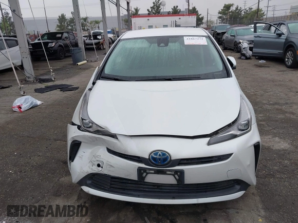 2021 Toyota Prius L Eco with VIN JTDKAMFU6M3150707, listed as a IAAI auction lot 41867272 with 55,499 mi miles and . Bid and sale history available at DreamBid. Image 13.