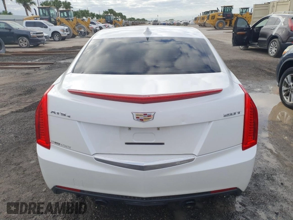 2016 Cadillac ATS Standard AWD z VIN 1G6AG5RX3G0106727, wystawiony jako Copart lot #55215165 z przebiegiem 74 974 mil mil oraz Nie do naprawy • Non repairable. Historia ofert i sprzedaży dostępna na DreamBid. Obrazek 6.