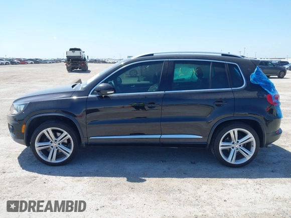 2014 Volkswagen Tiguan SEL with VIN WVGAV3AX4EW025339, listed as a IAAI auction lot 42313665 with 96,756 mi miles and . Bid and sale history available at DreamBid. Image 14.