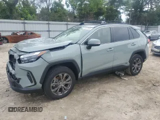 2023 Toyota RAV4 Hybrid XLE Premium with VIN JTMB6RFV8PD097109, listed as a Copart auction lot 59970995 with 43,197 mi miles and Salvage title. Bid and sale history available at DreamBid. Image 1.