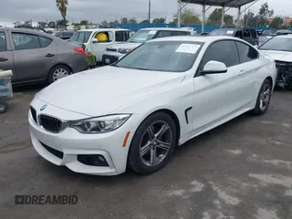 2015 BMW 4 Series 428i with VIN WBA3N7C58FK222925, listed as a IAAI auction lot 41776858 with 106,946 mi miles and . Bid and sale history available at carsss.com. Image 17.