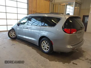 2021 Chrysler Voyager LXi with VIN 2C4RC1DG2MR506453, listed as a IAAI auction lot 41770938 with 90,255 mi miles and . Bid and sale history available at DreamBid. Image 3.