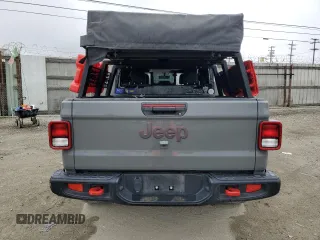 2021 Jeep Gladiator Rubicon with VIN 1C6JJTBG5ML615653, listed as a Copart auction lot 51297795 with 48,918 mi miles and Salvage title. Bid and sale history available at DreamBid. Image 6.