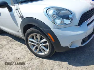 2014 MINI Countryman S z VIN WMWZC5C52EWP39083, wystawiony jako IAAI lot #42409957 z przebiegiem 73 497 mil mil oraz . Historia ofert i sprzedaży dostępna na DreamBid. Obrazek 6.