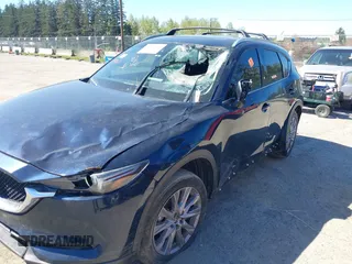 2020 Mazda CX-5 Grand Touring with VIN JM3KFBDM7L0724005, listed as a IAAI auction lot 42034658 with 90,631 mi miles. Bid and sale history available at carsss.com. Image 6.