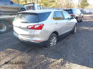 2021 Chevrolet Equinox LT with VIN 3GNAXUEV6MS165648, listed as a IAAI auction lot 41554980 with 71,647 mi miles and . Bid and sale history available at DreamBid. Image 4.