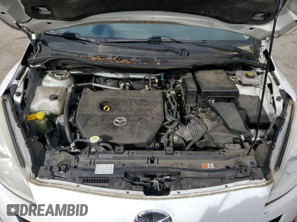 2013 Mazda 5 Sport with VIN JM1CW2BL6D0149713, listed as a Copart auction lot 50069095 with 71,987 mi miles and Salvage Title. Bid and sale history available at DreamBid. Image 12.