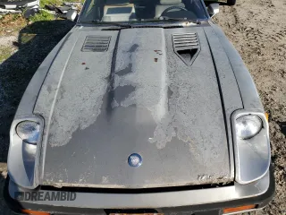 1983 Datsun 280ZX z VIN JN1HZ04S6DX571982, wystawiony jako Copart lot #86317294 z przebiegiem Nie podano mil oraz Tytuł czysty. Historia ofert i sprzedaży dostępna na DreamBid. Obrazek 11.