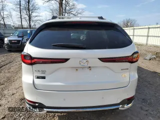 2024 Mazda CX-90 S Premium z VIN JM3KKDHC6R1183914, wystawiony jako Copart lot #51612045 z przebiegiem 897 mil mil oraz Szkoda całkowita • Salvage title. Historia ofert i sprzedaży dostępna na DreamBid. Obrazek 6.