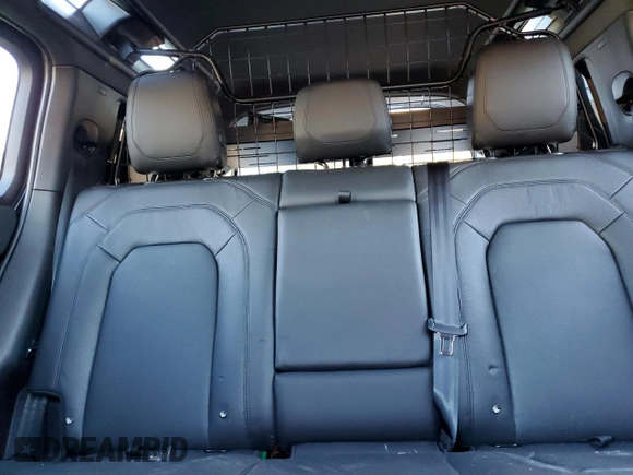2023 Land Rover Defender S with VIN SALEJ7EX3P2121582, listed as a Copart auction lot 77433164 with 26,507 mi miles and Salvage title. Bid and sale history available at DreamBid. Image 10.