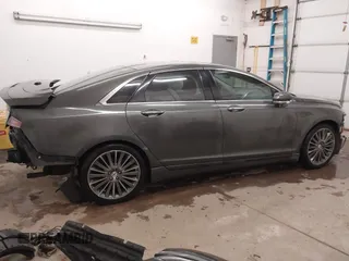 2015 Lincoln MKZ Hybrid z VIN 3LN6L2LU0FR624283, wystawiony jako IAAI lot #41402447 z przebiegiem 79 883 mil mil oraz . Historia ofert i sprzedaży dostępna na DreamBid. Obrazek 14.