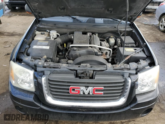 2005 GMC Envoy SLT with VIN 1GKDT13S352366014, listed as a Copart auction lot 43006165 with 126,721 mi miles and Clean Title. Bid and sale history available at carsss.com. Image 12.