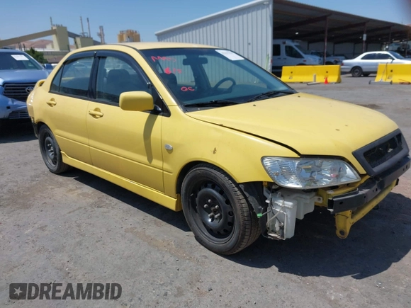 2002 Mitsubishi Lancer OZ-Rally z VIN JA3AJ86EX2U073129, wystawiony jako IAAI lot #42337379 z przebiegiem 257 556 mil mil oraz . Historia ofert i sprzedaży dostępna na DreamBid. Obrazek 1.