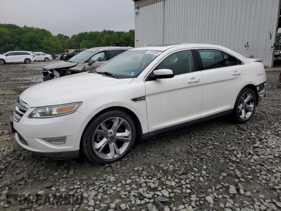 2012 Ford Taurus SHO with VIN 1FAHP2KT2CG141879, listed as a Copart auction lot 56558365 with 105,230 mi miles and Salvage title. Bid and sale history available at DreamBid. Image 1.