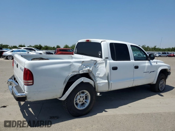 2000 Dodge Dakota Sport with VIN 1B7GG2AN8YS598547, listed as a Copart auction lot 54520985 with 244,605 mi miles and Salvage Title. Bid and sale history available at carsss.com. Image 3.