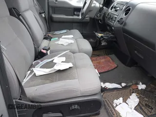 2005 Ford F-150 XL with VIN 1FTRF12W85NC00664, listed as a IAAI auction lot 42046282 with 167,105 mi miles. Bid and sale history available at carsss.com. Image 5.