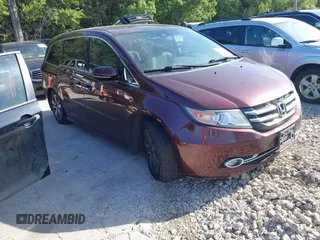 2015 Honda Odyssey Touring Elite with VIN 5FNRL5H90FB033394, listed as a IAAI auction lot 42789239 with Not provided miles and . Bid and sale history available at DreamBid. Image 1.
