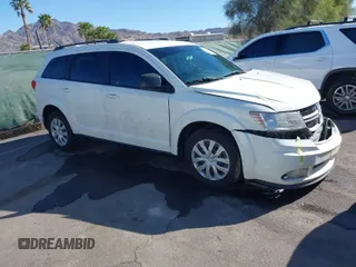 2014 Dodge Journey American Value Pkg with VIN 3C4PDCAB5ET230096, listed as a IAAI auction lot 41846510 with 178,397 mi miles. Bid and sale history available at carsss.com. Image 1.