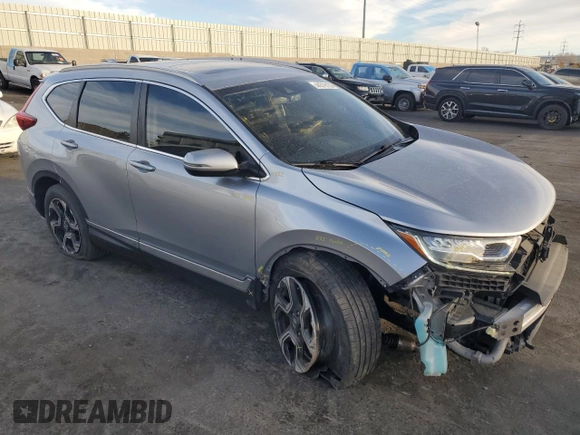 2017 Honda CR-V Touring with VIN 5J6RW2H9XHL017476, listed as a Copart auction lot 44378135 with 57,991 mi miles and Salvage Title. Bid and sale history available at carsss.com. Image 4.