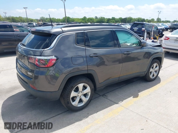 2020 Jeep Compass Latitude with VIN 3C4NJCBB3LT136018, listed as a IAAI auction lot 41915073 with 80,785 mi miles and . Bid and sale history available at carsss.com. Image 4.