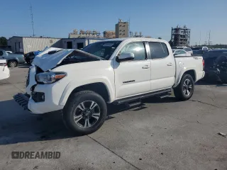 2018 Toyota Tacoma SR5 with VIN 3TMAZ5CN1JM074296, listed as a Copart auction lot 63682455 with 76,208 mi miles and Salvage title. Bid and sale history available at DreamBid. Image 1.