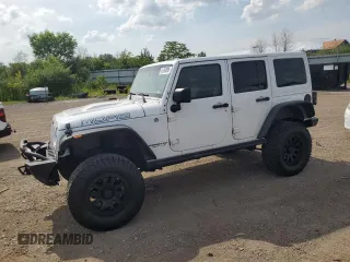 2013 Jeep Wrangler Unlimited Sahara with VIN 1C4BJWEG7DL567065, listed as a Copart auction lot 61368895 with 127,838 mi miles and Salvage title. Bid and sale history available at DreamBid. Image 1.