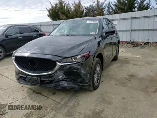 2017 Mazda CX-5 Touring with VIN JM3KFACLXH0195725, listed as a Copart auction lot 47464365 with 65,457 mi miles and Salvage Title. Bid and sale history available at carsss.com. Image 12.