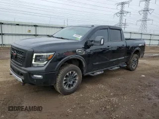 2020 Nissan Titan XD Platinum Reserve with VIN 1N6AA1FB8LN510908, listed as a Copart auction lot 49308085 with 60,154 mi miles and Salvage Title. Bid and sale history available at carsss.com. Image 1.