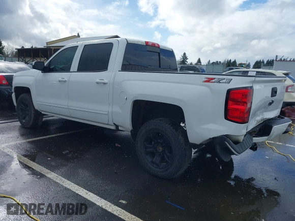 2018 Chevrolet Silverado 1500 LT with VIN 3GCUKREC5JG595959, listed as a IAAI auction lot 41608507 with 117,824 mi miles. Bid and sale history available at carsss.com. Image 3.