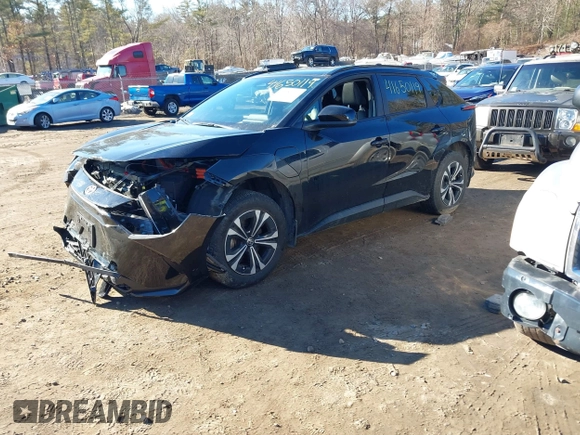 2023 Toyota bZ4X XLE with VIN JTMABACA2PA022658, listed as a IAAI auction lot 41650119 with 19,929 mi miles and . Bid and sale history available at DreamBid. Image 2.