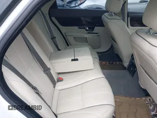 2013 Jaguar XJ Portfolio with VIN SAJWJ2GD3D8V48238, listed as a IAAI auction lot 40435160 with 136,738 mi miles and . Bid and sale history available at DreamBid. Image 8.